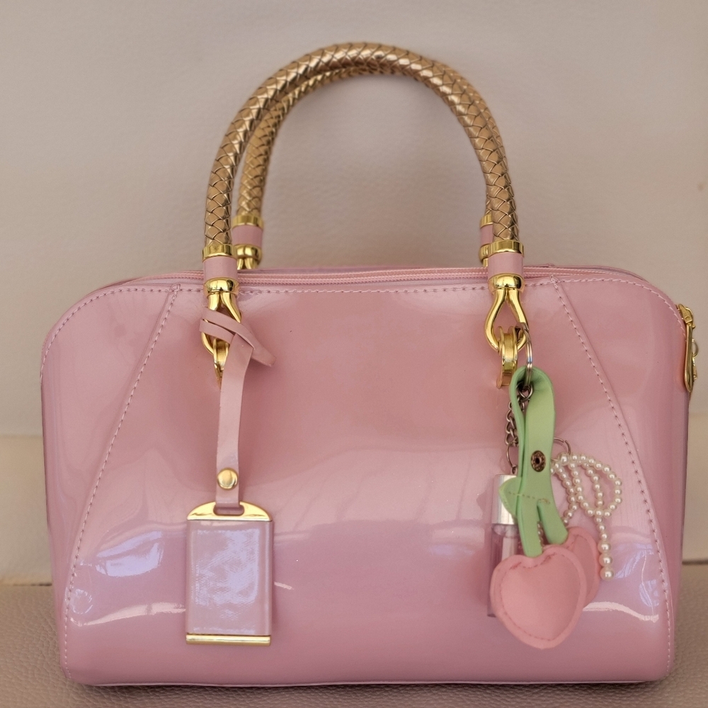 Elegant Pink Handbag with Gold Accents - Picture 3 of 7